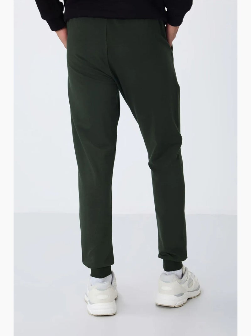 Pantalon de jogging homme en molton uni tommy Vert foncé - Kiabi