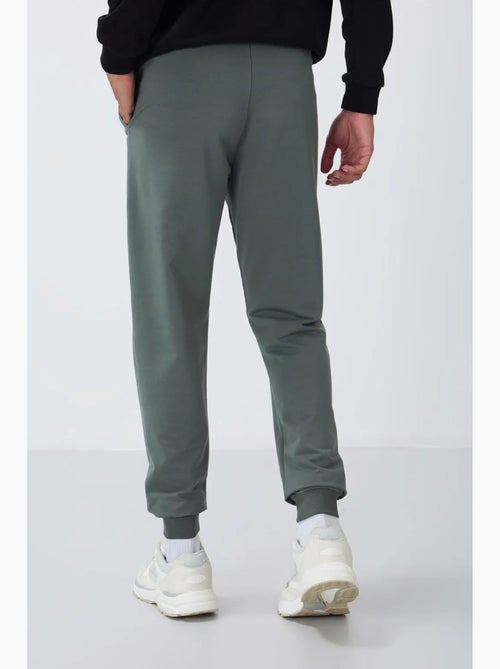 Pantalon de jogging homme en molton uni tommy - Kiabi Pantalon de jogging homme en molton uni tommy - Kiabi