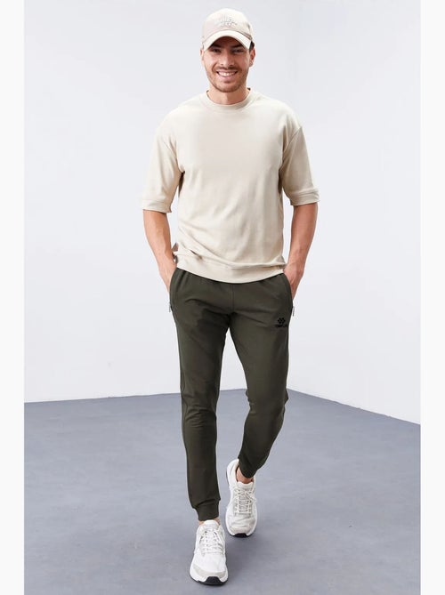 Pantalon de jogging homme slim en molleton tommy - Kiabi Pantalon de jogging homme slim en molleton tommy - Kiabi