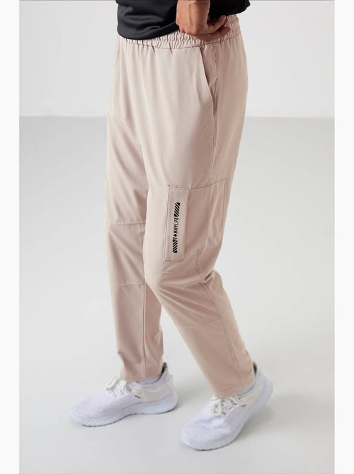 Pantalon de jogging homme uni à taille élastique tommy - Kiabi Pantalon de jogging homme uni à taille élastique tommy - Kiabi