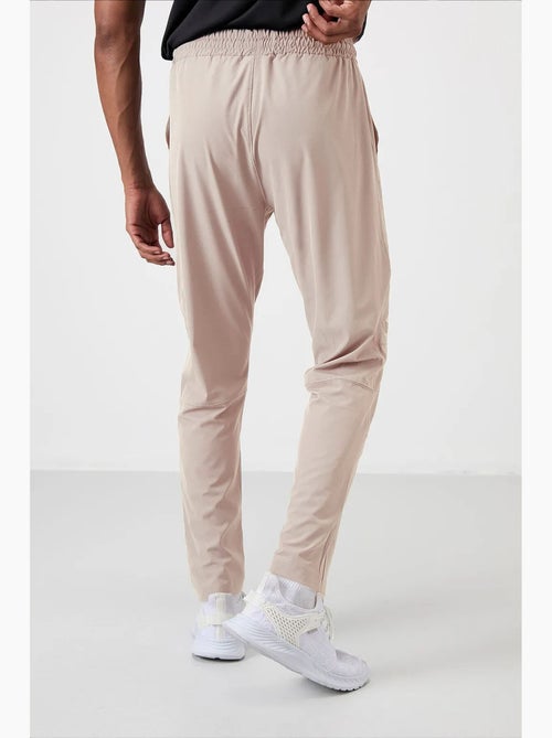 Pantalon de jogging homme uni à taille élastique tommy - Kiabi Pantalon de jogging homme uni à taille élastique tommy - Kiabi