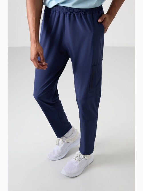Pantalon de jogging homme uni à taille élastique tommy - Kiabi Pantalon de jogging homme uni à taille élastique tommy - Kiabi
