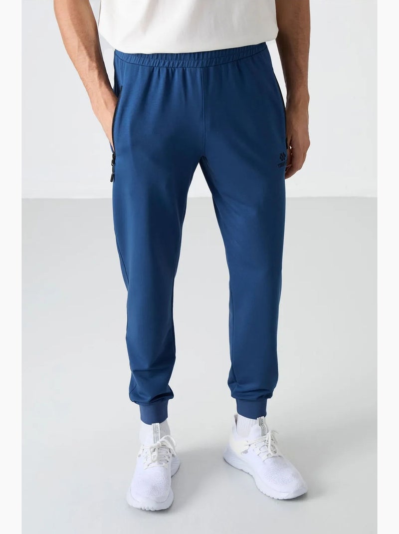 Pantalon de jogging homme uni avec poche zippée tommy Bleu - Kiabi