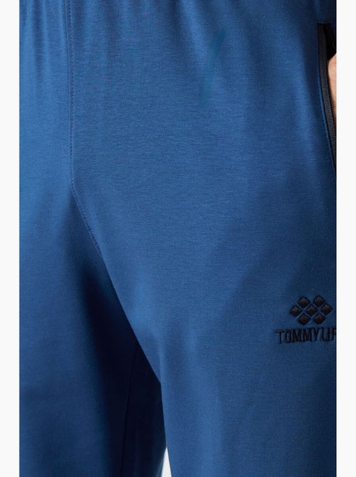 Pantalon de jogging homme uni avec poche zippée tommy - Kiabi Pantalon de jogging homme uni avec poche zippée tommy - Kiabi