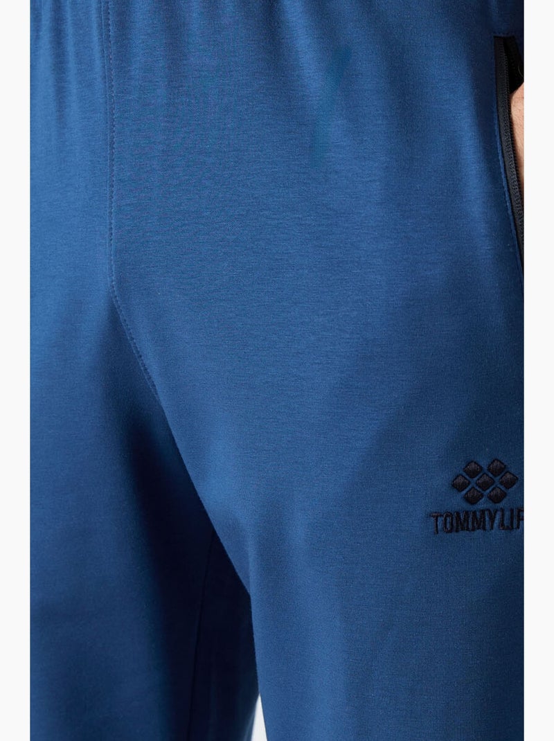 Pantalon de jogging homme uni avec poche zippée tommy Bleu - Kiabi