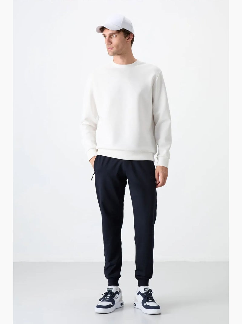 Pantalon de jogging homme uni avec poche zippée tommy Bleu marine - Kiabi