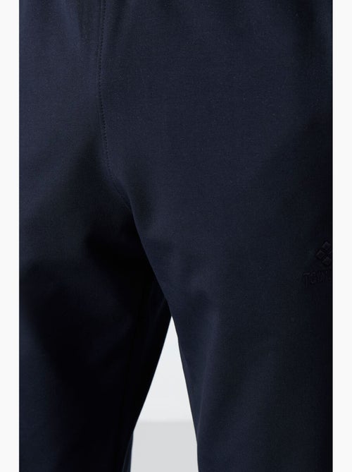 Pantalon de jogging homme uni avec poche zippée tommy - Kiabi Pantalon de jogging homme uni avec poche zippée tommy - Kiabi