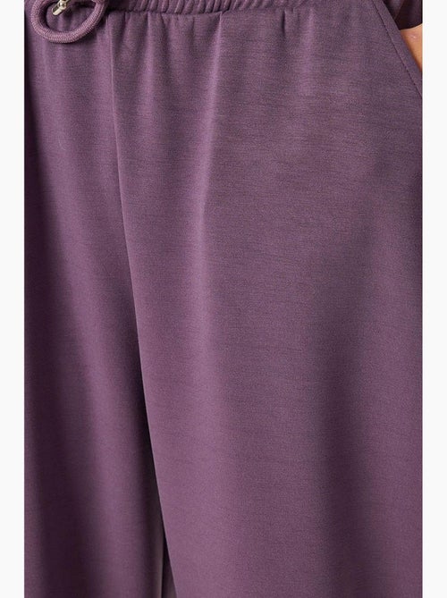 Pantalon de jogging jambe large à taille à cordon istanbul - Kiabi Pantalon de jogging jambe large à taille à cordon istanbul - Kiabi