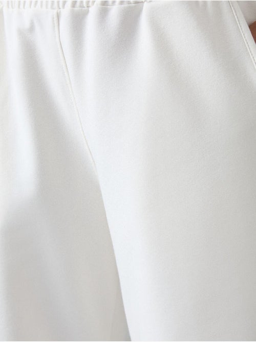Pantalon de jogging large à enfiler tommy - Kiabi Pantalon de jogging large à enfiler tommy - Kiabi