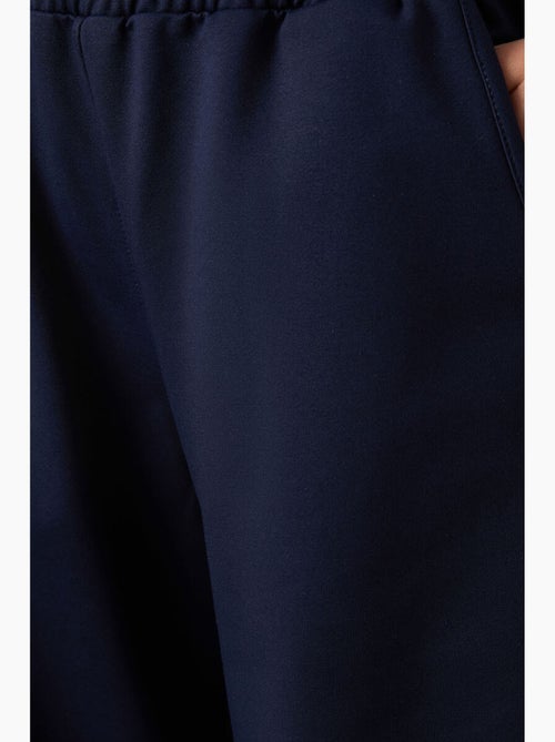 Pantalon de jogging large à enfiler tommy - Kiabi Pantalon de jogging large à enfiler tommy - Kiabi