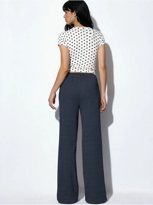 Pantalon de jogging rayé à jambe droite busem - Kiabi Pantalon de jogging rayé à jambe droite busem - Kiabi