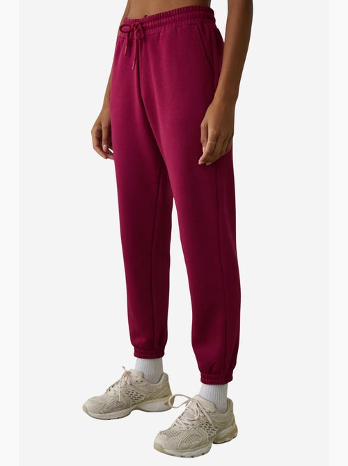 Pantalon de jogging taille haute avec détail à nouer, molletonné penti - Kiabi Pantalon de jogging taille haute avec détail à nouer, molletonné penti - Kiabi