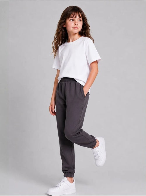 Pantalon de jogging unisexe junior à jambe fuselée tommy - Kiabi Pantalon de jogging unisexe junior à jambe fuselée tommy - Kiabi