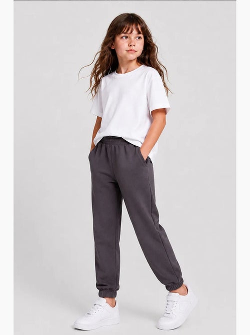 Pantalon de jogging unisexe junior à jambe fuselée tommy - Kiabi Pantalon de jogging unisexe junior à jambe fuselée tommy - Kiabi