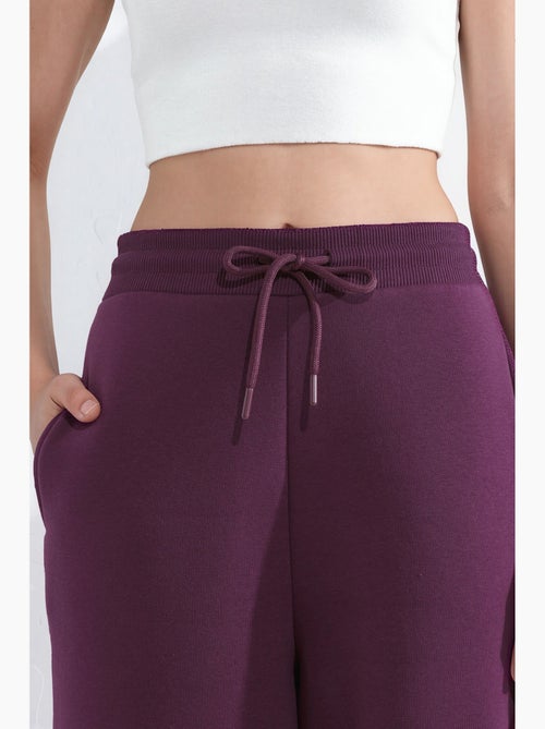 Pantalon de survêtement basique à coupe ajustée et surélevée hiccup - Kiabi Pantalon de survêtement basique à coupe ajustée et surélevée hiccup - Kiabi