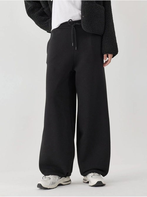 Pantalon de survêtement basique à coupe ajustée et surélevée - Kiabi Pantalon de survêtement basique à coupe ajustée et surélevée - Kiabi