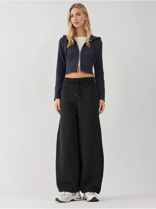 Pantalon de survêtement basique à coupe ajustée et surélevée - Kiabi Pantalon de survêtement basique à coupe ajustée et surélevée - Kiabi
