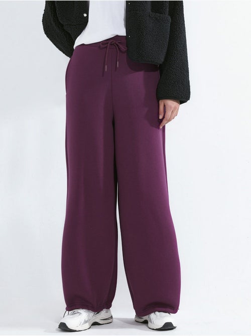 Pantalon de survêtement basique à coupe ajustée et surélevée - Kiabi Pantalon de survêtement basique à coupe ajustée et surélevée - Kiabi