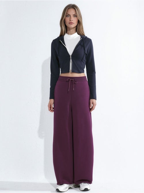 Pantalon de survêtement basique à coupe ajustée et surélevée - Kiabi Pantalon de survêtement basique à coupe ajustée et surélevée - Kiabi