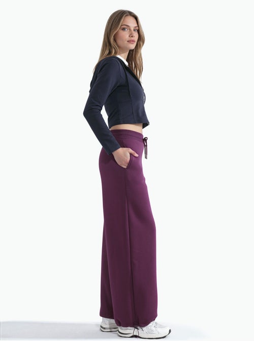 Pantalon de survêtement basique à coupe ajustée et surélevée - Kiabi Pantalon de survêtement basique à coupe ajustée et surélevée - Kiabi