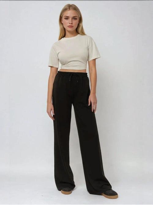 Pantalon de survêtement élastique à jambes larges hiccup - Kiabi Pantalon de survêtement élastique à jambes larges hiccup - Kiabi