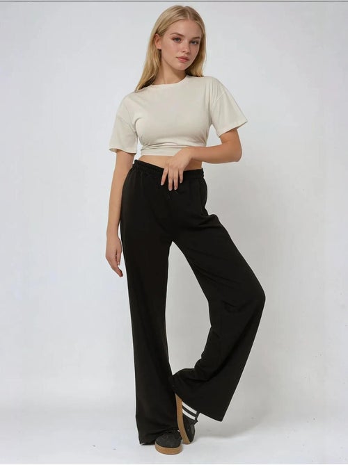 Pantalon de survêtement élastique à jambes larges hiccup - Kiabi Pantalon de survêtement élastique à jambes larges hiccup - Kiabi