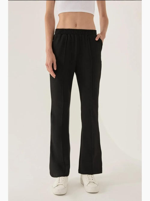 Pantalon de survêtement évasé hiccup - Kiabi Pantalon de survêtement évasé hiccup - Kiabi