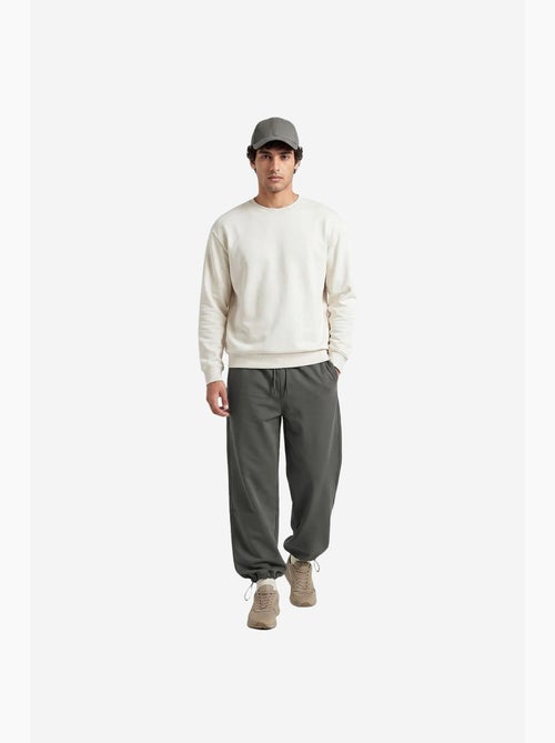 Pantalon de survêtement homme en mélange de coton tommy - Kiabi Pantalon de survêtement homme en mélange de coton tommy - Kiabi
