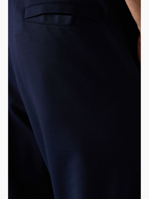 Pantalon de survêtement homme jogger en molleton tommy - Kiabi Pantalon de survêtement homme jogger en molleton tommy - Kiabi