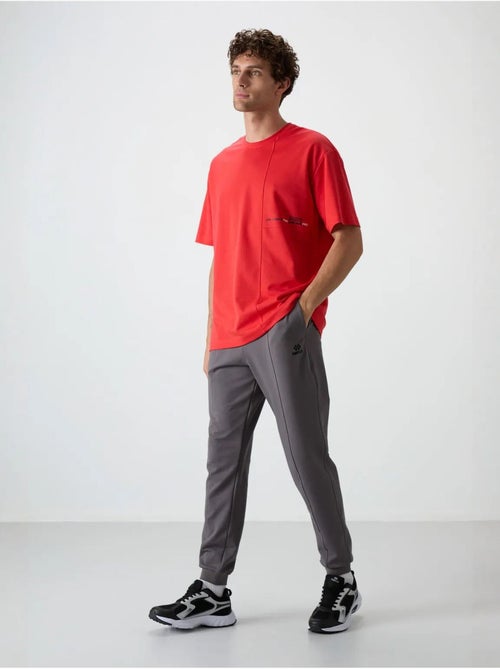 Pantalon de survêtement homme jogger en molleton tommy - Kiabi Pantalon de survêtement homme jogger en molleton tommy - Kiabi