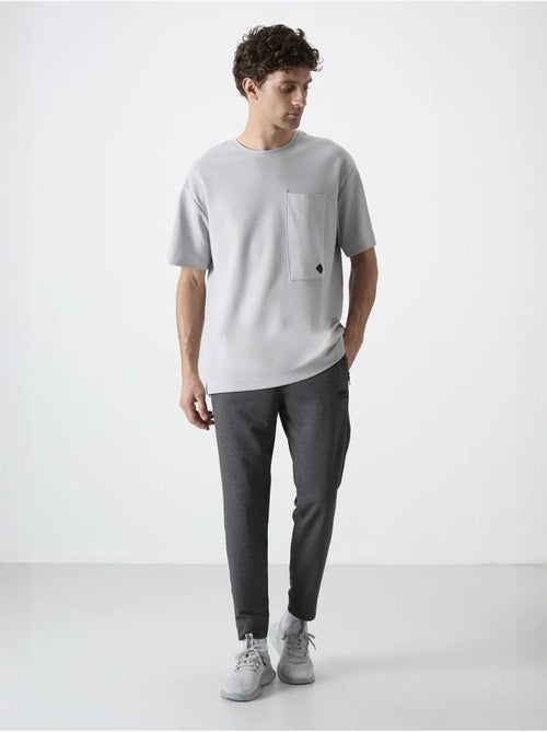 Pantalon de survêtement homme jogger uni tommy - Kiabi Pantalon de survêtement homme jogger uni tommy - Kiabi