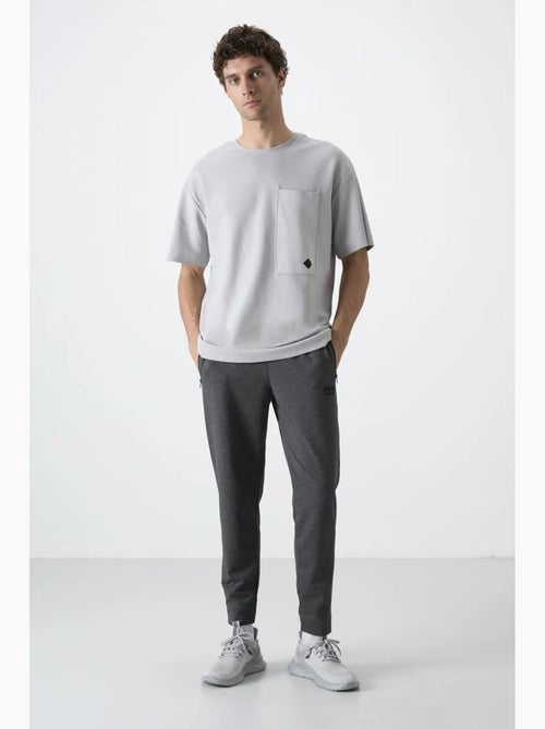 Pantalon de survêtement homme jogger uni tommy - Kiabi Pantalon de survêtement homme jogger uni tommy - Kiabi