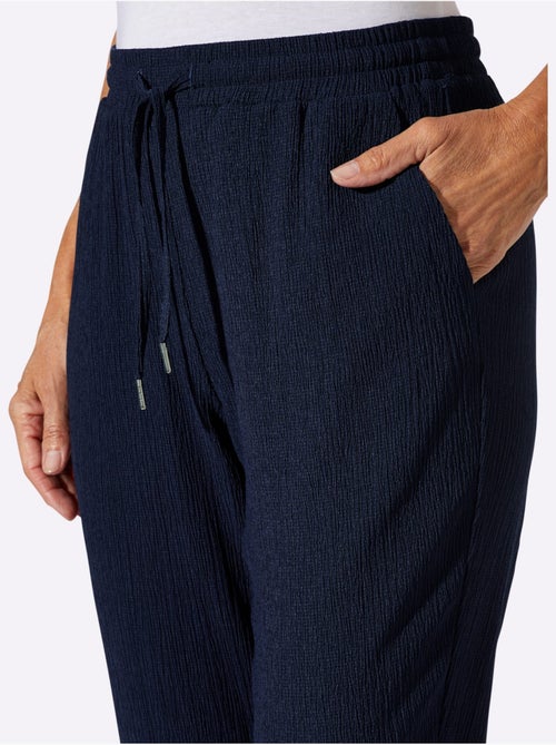 Pantalon décontracté à ceinture élastique avec poches latérales - Taille standard - Moda Vilona - Kiabi Pantalon décontracté à ceinture élastique avec poches latérales - Taille standard - Moda Vilona - Kiabi