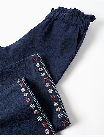 Pantalon en coton à jambe large avec fleurs brodées