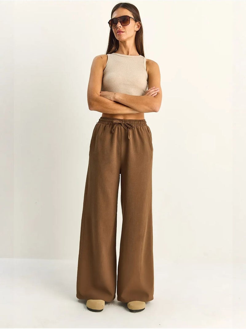 Pantalon en coton à jambes larges avec cordon à la taille lucci Marron clair - Kiabi
