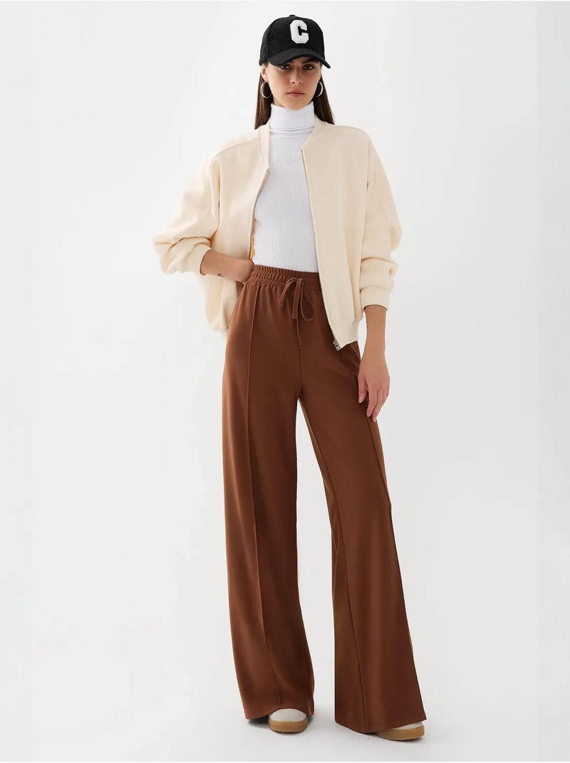 Pantalon en jersey à taille élastique et jambes larges Marron - Kiabi