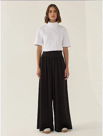 Pantalon en jersey à taille haute et jambes larges plissées