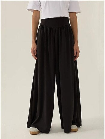 Pantalon en jersey à taille haute et jambes larges plissées