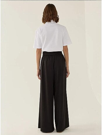 Pantalon en jersey à taille haute et jambes larges plissées