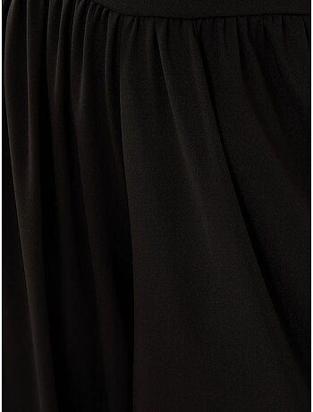 Pantalon en jersey à taille haute et jambes larges plissées