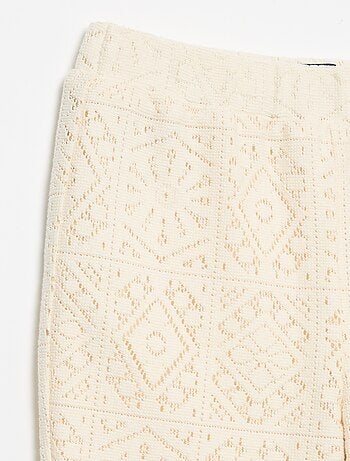 Pantalon en maille effet crochet coupe flare