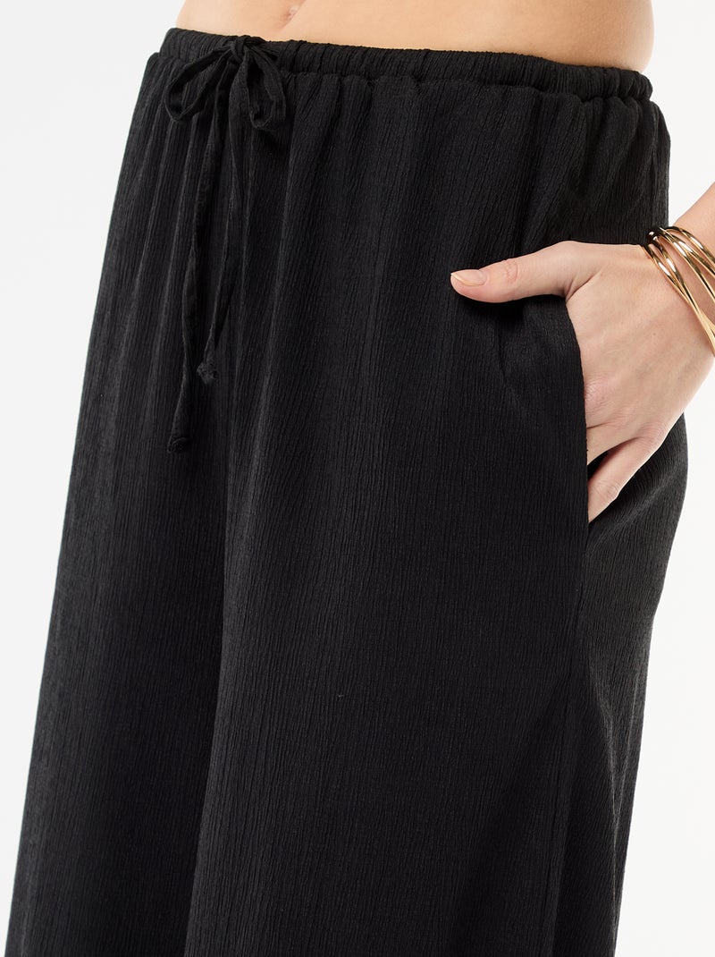 Pantalon en maille légère à coupe large pour femme Noir - Kiabi