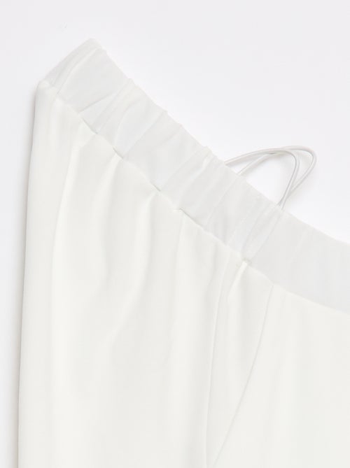 Pantalon en maille légère pour femme à coupe large et taille haute - Kiabi Pantalon en maille légère pour femme à coupe large et taille haute - Kiabi