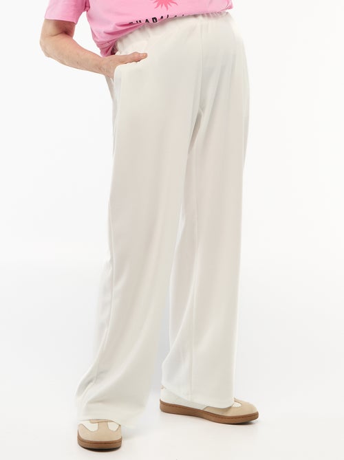 Pantalon en maille légère pour femme à coupe large et taille haute - Kiabi Pantalon en maille légère pour femme à coupe large et taille haute - Kiabi