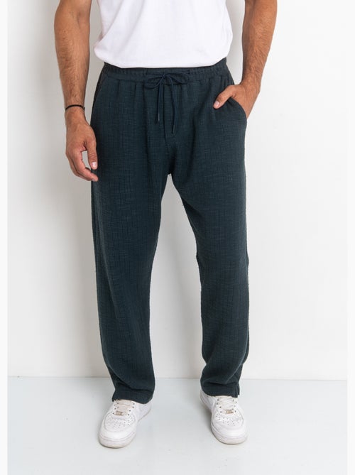 Pantalon en maille lien à la taille - AFIBEL - Kiabi Pantalon en maille lien à la taille - AFIBEL - Kiabi