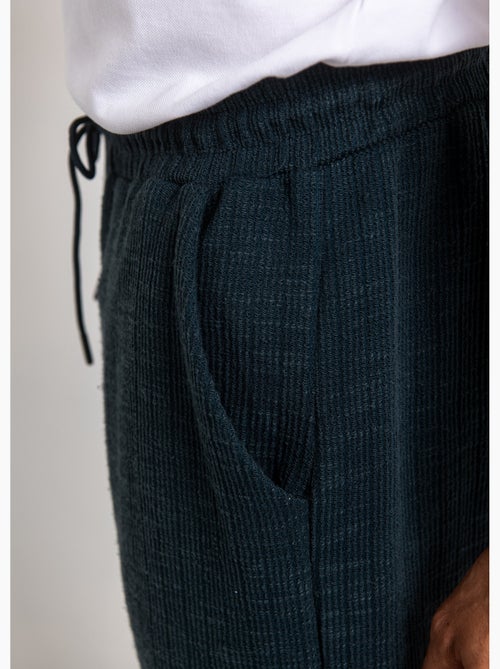 Pantalon en maille lien à la taille - AFIBEL - Kiabi Pantalon en maille lien à la taille - AFIBEL - Kiabi