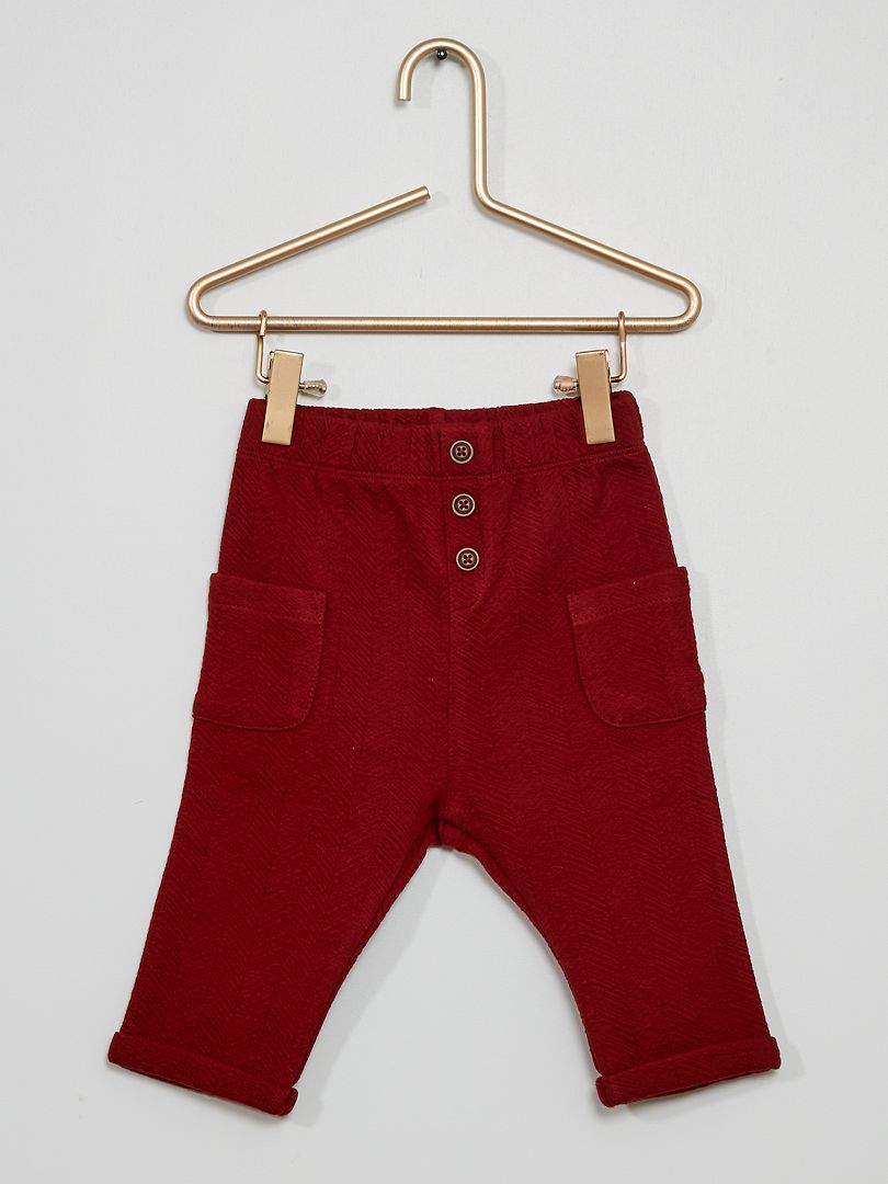 Pantalon en maille relief 'chevrons' rouge brique - Kiabi