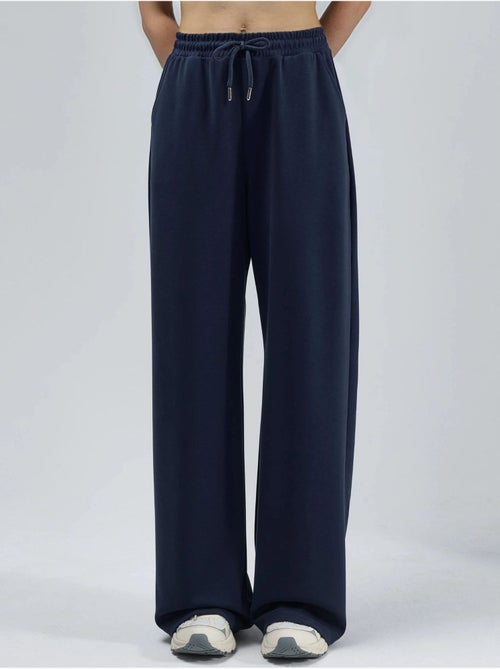 Pantalon en maille taille haute et jambes larges busem - Kiabi Pantalon en maille taille haute et jambes larges busem - Kiabi