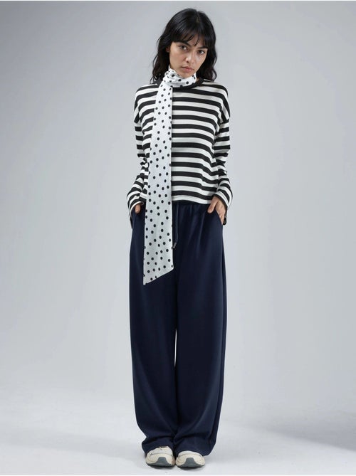 Pantalon en maille taille haute et jambes larges busem - Kiabi Pantalon en maille taille haute et jambes larges busem - Kiabi