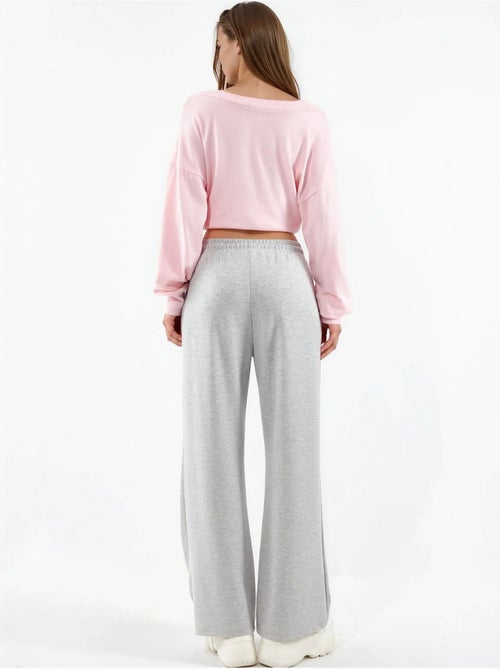 Pantalon en maille taille haute et jambes larges busem - Kiabi Pantalon en maille taille haute et jambes larges busem - Kiabi